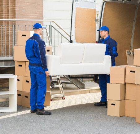 two men unloading truck with boxes