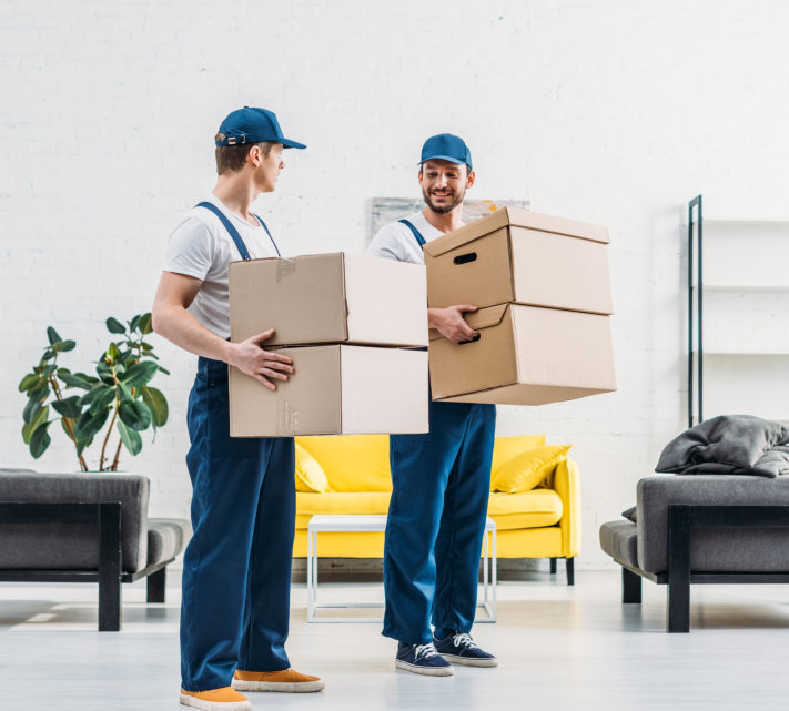 young couple preparing things for move out